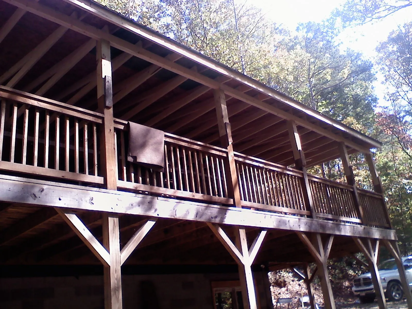 Timber framing under a new elevated porch and deck — Roof Leak Repair in Hillister by Roofing Brothers